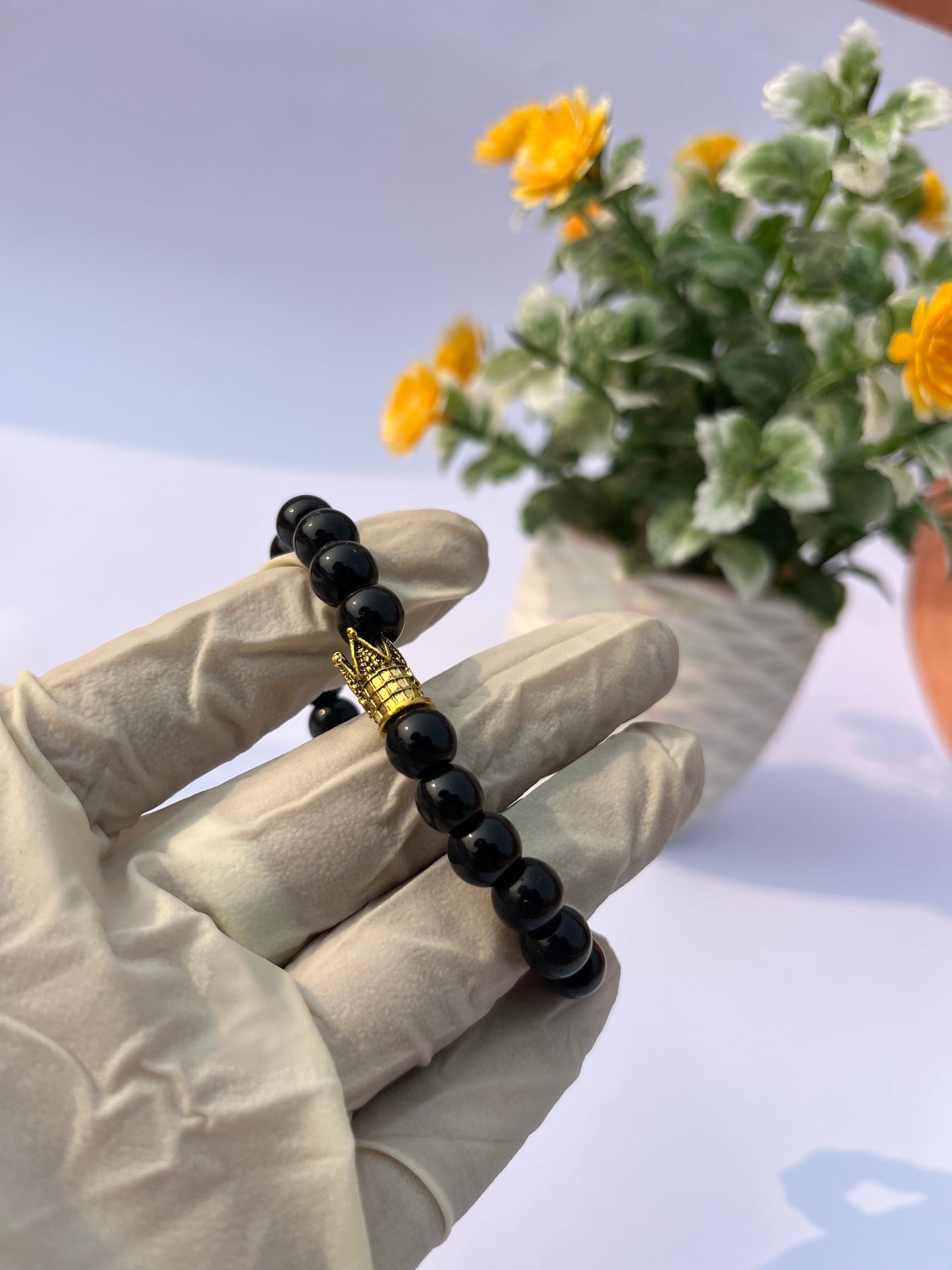 Black beads bracelets with stylish crowns