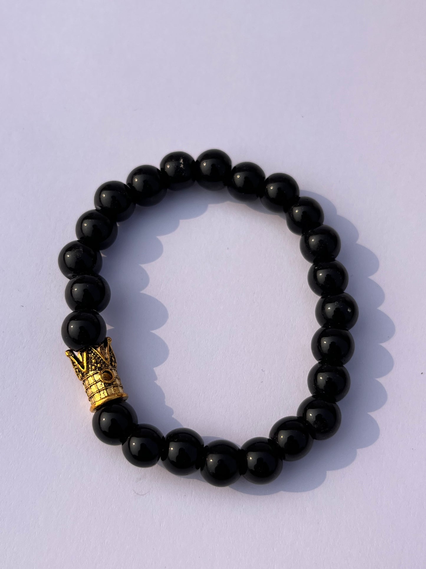 Black beads bracelets with stylish crowns